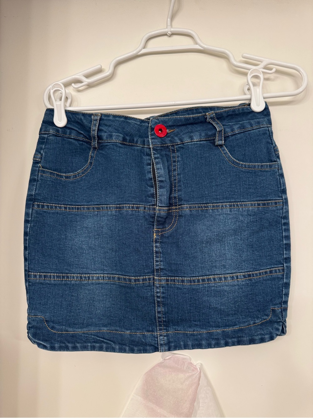 Denim Mini Skirt in Dark Blue with Red Button